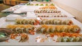 Mix of sushi buffet and rolls, Japanese traditional food, Dishes from raw fish in restaurant Royalty Free Stock Photo