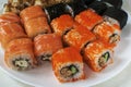 Mix of sushi and rolls macro. Japanese traditional food. Dishes from raw fish Royalty Free Stock Photo