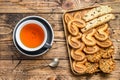 Mix of sweet cookies with cap of tea. wooden background. Top view Royalty Free Stock Photo