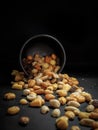 Mix of tasty nuts on dark table Royalty Free Stock Photo