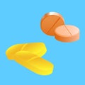 Mix of three different types of multicolored tablets, yellow, orange, round and oval on blue background Royalty Free Stock Photo