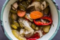 Mix of Turkish Pickles with green tomatoes, red pepper, cucumber and carrot. Royalty Free Stock Photo