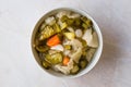 Mix of Turkish Pickles with Hot Green Pepper, Cabbage, Sauerkraut, Carrot and Cucumber in Bowl. Royalty Free Stock Photo