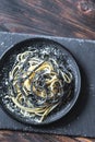 Mix of white and black pasta with cheese Royalty Free Stock Photo