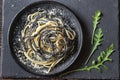 Mix of white and black pasta with cheese Royalty Free Stock Photo