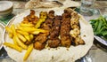 Mixed arabic barbeque on flat bread