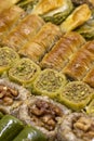 Mixed baklava. Pistachio and walnut baklava. Close-up of baklava in a tray Royalty Free Stock Photo