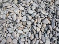 Mixed beach pebble stones background