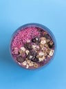 Mixed Berry Acai Smoothie Bowl on a light blue background