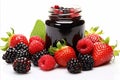 Mixed berry jam with fresh strawberries, blueberries, and blackberries on white background for text Royalty Free Stock Photo