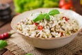 Mixed boiled rice with chilli and basil.