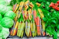 Mixed of cabbage, rainbow carrots, spinach and radishes at food store in America Royalty Free Stock Photo