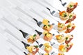 Mixed canapes on metal forks. White background