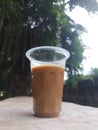 Mixed coffee drink in aqua glass. Looks beautiful taken on the edge of a ditch at Tanjung Duren Park, West JakartaÃ¯Â¿Â¼