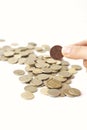 Mixed coin stacks on a white background