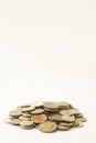 Mixed coin stacks on a white background