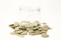 Mixed coin stacks on a white background