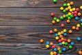 Mixed collection of colorful candy, on colored background. Flat lay, top view. frame of colorful chocolate coated candy Royalty Free Stock Photo