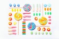 Mixed collection of colorful candy, on white background. Flat lay, top view Royalty Free Stock Photo