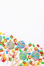 Mixed collection of colorful candy, on white background. Flat lay, top view Royalty Free Stock Photo