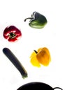 Mixed colorated peppers on white background Royalty Free Stock Photo