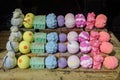 Mixed colored aromatic bath bombs in display for sale in an window store, in soft focus Royalty Free Stock Photo