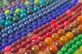 Mixed colors beads close-up made from natural stones or glass marbles Royalty Free Stock Photo