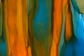 Mixed colors watercolor texture background. Hand drawn orange and navy smears, splashes abstract backdrop, alcohol ink.