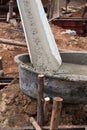 Mixed concrete pouring at construction site Royalty Free Stock Photo