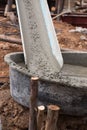 Mixed concrete pouring at construction site Royalty Free Stock Photo