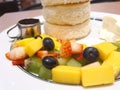 Mixed Cut fruit served in a thick pancake dish Royalty Free Stock Photo