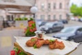 Mixed deep fried appetizer with dip sauce. Fried chicken, beer snack with dip sauce served on a wooden board