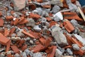 Mixed and demolished construction waste, container on a construction site with different rubble made of concrete and cement and Royalty Free Stock Photo