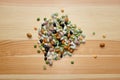 Mixed dried beans and peas on a wooden background