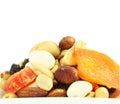 Mixed dried fruits nuts trail mix closeup in white background Royalty Free Stock Photo