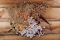 Mixed dried legumes and cereals isolated on wooden background, top view Royalty Free Stock Photo