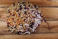 Mixed dried legumes and cereals isolated on wooden background, top view Royalty Free Stock Photo
