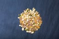Mixed dried legumes and cereals one slate background, top view Royalty Free Stock Photo