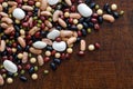 Mixed dry beans on dark wood from above. Royalty Free Stock Photo