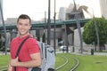 Mixed ethnicity student smiling outdoors Royalty Free Stock Photo