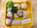 Mixed fish dumplings, fish ball on dish with sauce Royalty Free Stock Photo