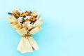 Mixed flower bouquet on blue background Royalty Free Stock Photo