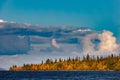 Mixed forest with colorful foliage on the Imandra lake. Autumn landscape, Kola Peninsula, Russia