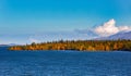 Mixed forest with colorful foliage on Imandra Lake near the Khibiny mountains. Autumn landscape, Kola Peninsula, Russia