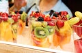 Mixed fresh fruits in a glass - healthy eating - diet concept