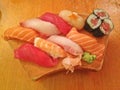 Mixed fresh Japanese sushi platter served on wooden plate Royalty Free Stock Photo