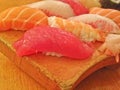 Mixed fresh Japanese sushi platter served on wooden plate Royalty Free Stock Photo