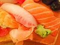 Mixed fresh Japanese sushi platter served on wooden plate Royalty Free Stock Photo