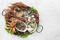 Mixed fresh seafood gourmet platter on spanish restaurant table