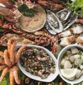 Mixed fresh seafood gourmet platter on spanish restaurant table